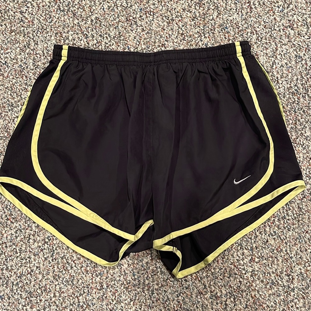 Nike athletic shorts, black and yellow size L